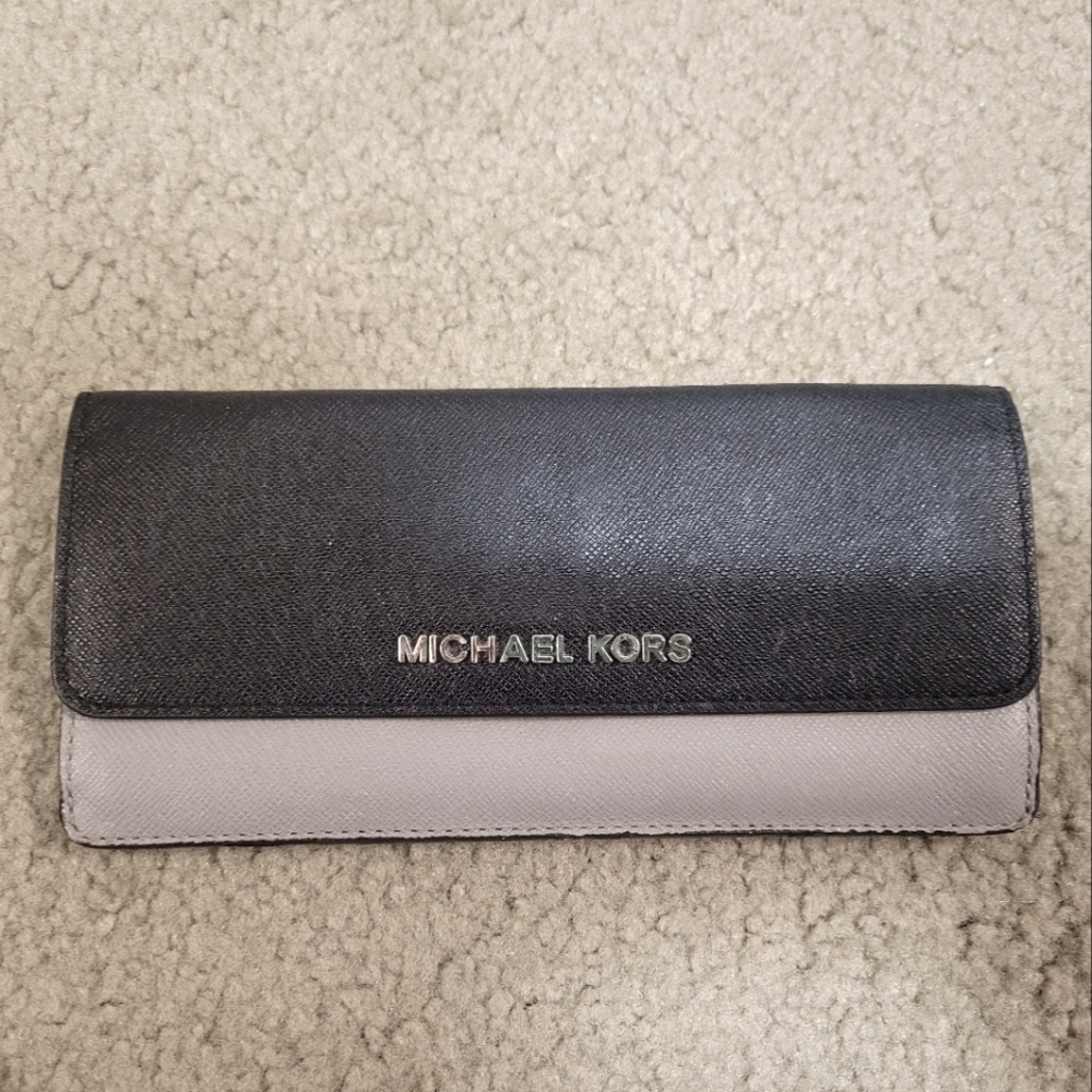 Black and gray Michael Kors snap wallet